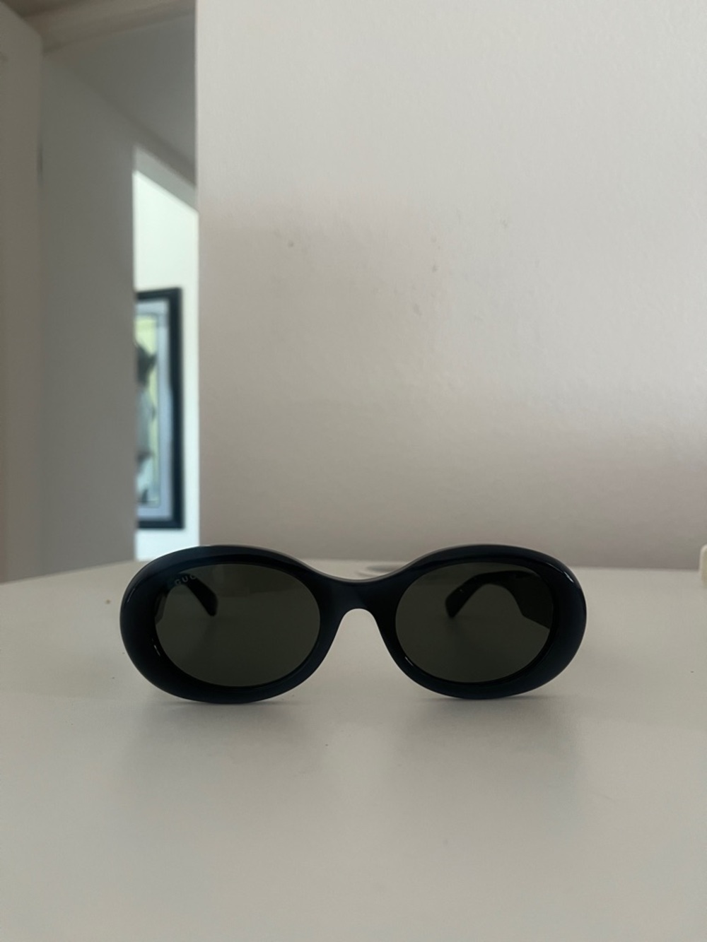 Gucci Black Round Frame Sunglasses with Gold Logo